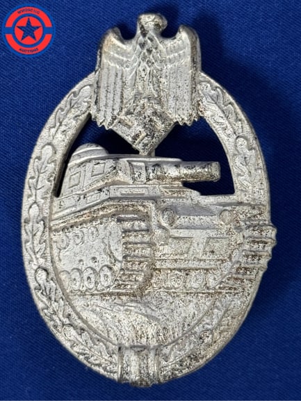 WW2 German Panzer Badge - Silver Grade: WW2 German Panzer Badge - Silver Grade - MAKER MARKED.The Panzer Assault Badge (Panzerkampfabzeichen) was a military decoration awarded by Nazi Germany during World War II to recognize the achievement