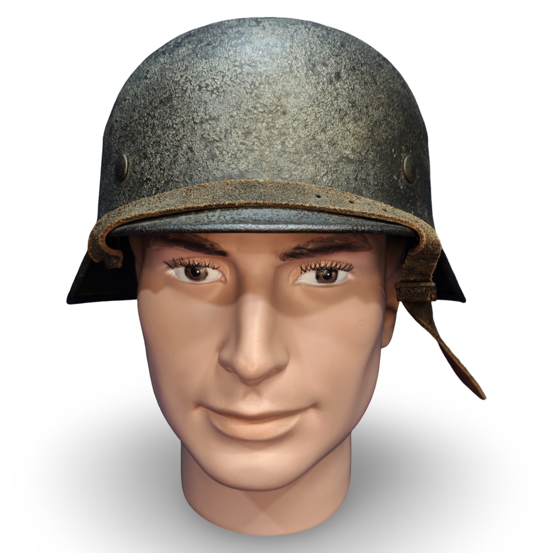 WWII German Third Reich M40 Luftwaffe Single Decal Stahlhelm: Stamped steel shell features embossed vent holes and rolled edges, confirming M40 production. The exact manufacturer stamp on the inner skirt is obscured by age and patina, but typical manufacturers