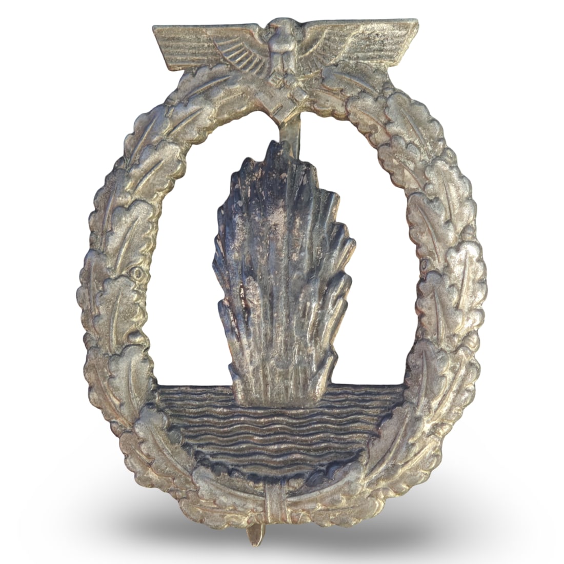 WW2 German Third Reich Minesweeper War Badge - Schwerin - Minensuchabzeichen: Schwerin, Berlin. The reverse prominently features the raised maker mark "FEC. OTTO PLACZEK BERLIN - AUSF. SCHWERIN BERLIN", indicating both the designer and the manufacturer.