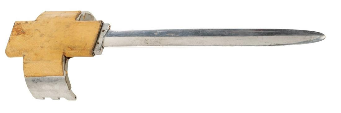 Sir Laurence Olivier 'Dr. Christian Szell' wrist knife: Sir Laurence Olivier "Dr. Christian Szell" wrist knife from Marathon Man. (Paramount, 1976) Vintage original weapon prop constructed of tooled aluminum, 2-piece bracelet with interior foam and tape pa