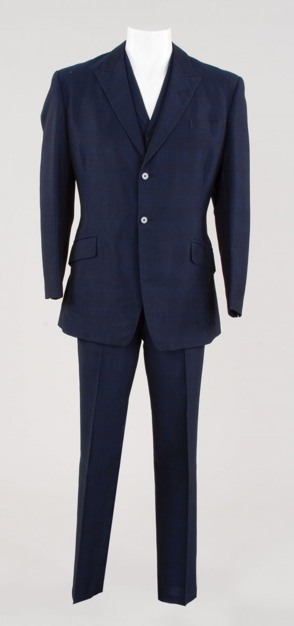 Patrick Macnee John Steed suit worn in The Avengers: 656. Patrick Macnee "John Steed" suit worn in The Avengers. (Associated British Corp., 1961-1969) Dark blue suit worn by Patrick Macnee in his role as the dapper secret agent "John Steed" in the Seaso