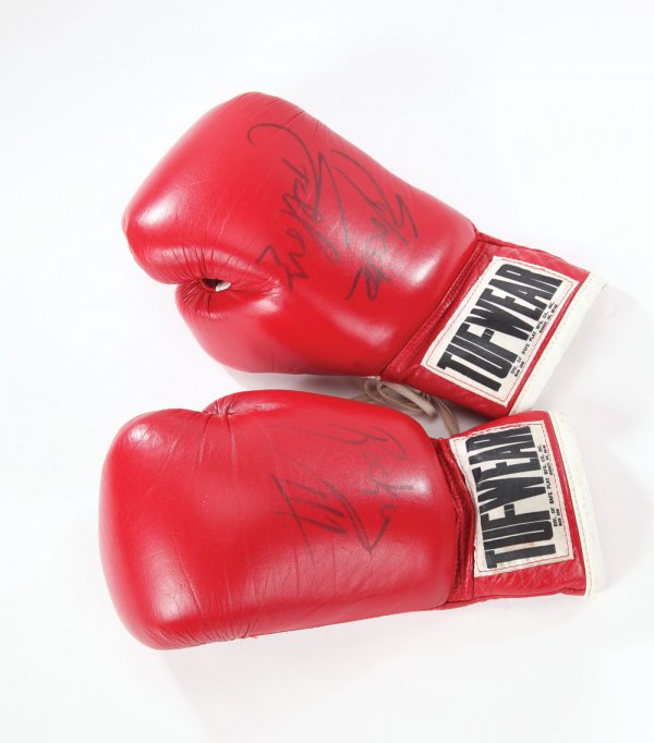 Sylvester Stallone sboxing gloves from Rocky III: 915. Sylvester Stallone "Rocky Balboa" screen-used boxing gloves from Rocky III. (UA, 1982) Red leather Tuf-Wear boxing gloves worn by Sylvester Stallone in his iconic role as "Rocky Balboa" in Rocky 