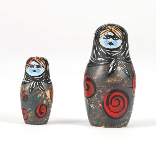 Nesting doll miniatures from Nightmare Before Christmas: 1014. Pair of screen-used nesting doll miniatures from The Nightmare Before Christmas. (Buena Vista, 1993) A pair of screen-used nesting doll miniatures clearly seen during the sequence that the Mr. H