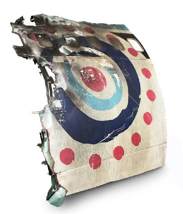 Large section of Oceanic Flight 815 wreckage: Large section of Oceanic Flight 815 wreckage. Very large section of Oceanic Flight 815 fuselage wreckage from the forward section of the aircraft, bearing the Oceanic Airlines logo and five windows. C