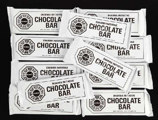 DHARMA-branded chocolate bars: DHARMA-branded chocolate bars. 8+ chocolate bars which are part of the large stock of constantly replenished and surprisingly diverse DHARMA-branded food that is brought to the Island by periodic air 