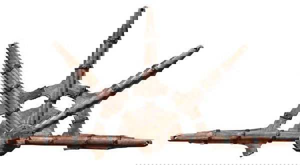 Island time-shifting frozen wheel: Island time-shifting frozen wheel. Made by the Man in Black in an early unknown time period on the Island, the wheel is set into the wall of an icy chamber deep beneath the Orchid station. Seen throug