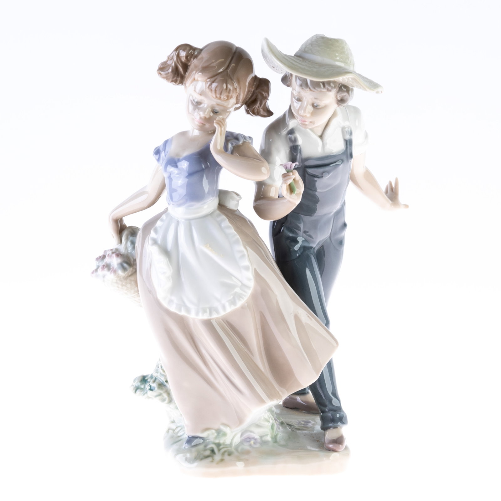 LLADRO PORCELAIN FIGURE: (HEIGHT) 24CM.From a collection of Wedgwood and other selected ceramic/porcelain objects. Kindly examine all photographs provided in this listing or ask for a condition report. All items offered are i