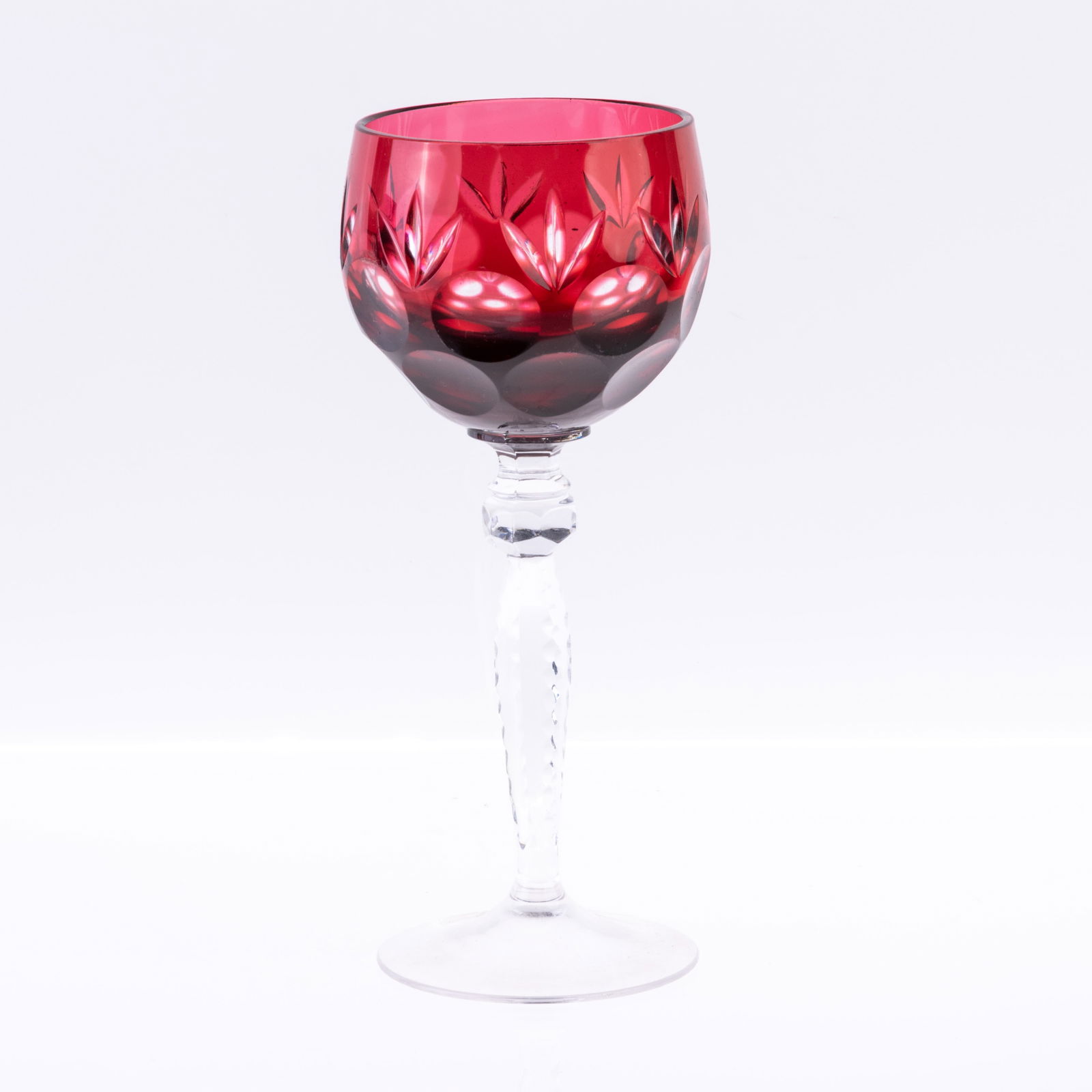 CRANBERRY CUT CRYSTAL HOCK WINE GLASS: (H) 20CM. From a collection of Wedgwood and other selected ceramic/porcelain objects. Kindly examine all photographs provided in this listing or ask for a condition report. All items offered are in ge