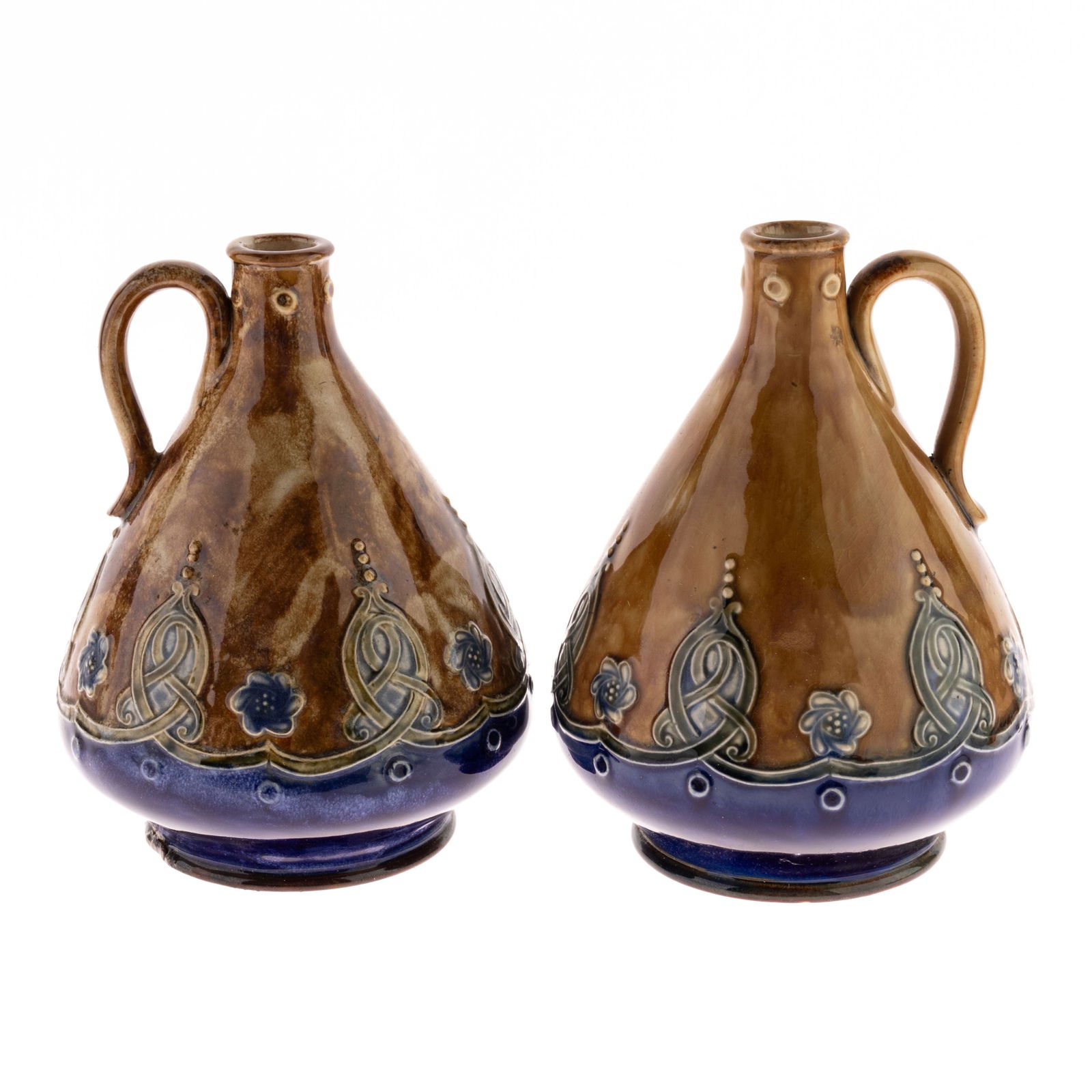 EARLY ART NOUVEAU DOULTON LAMBETH STONEWARE WHISKEY FLASKS: From a collection of Wedgwood and other selected ceramic/porcelain objects. Kindly examine all photographs provided in this listing or ask for a condition report. All items offered are in generally go