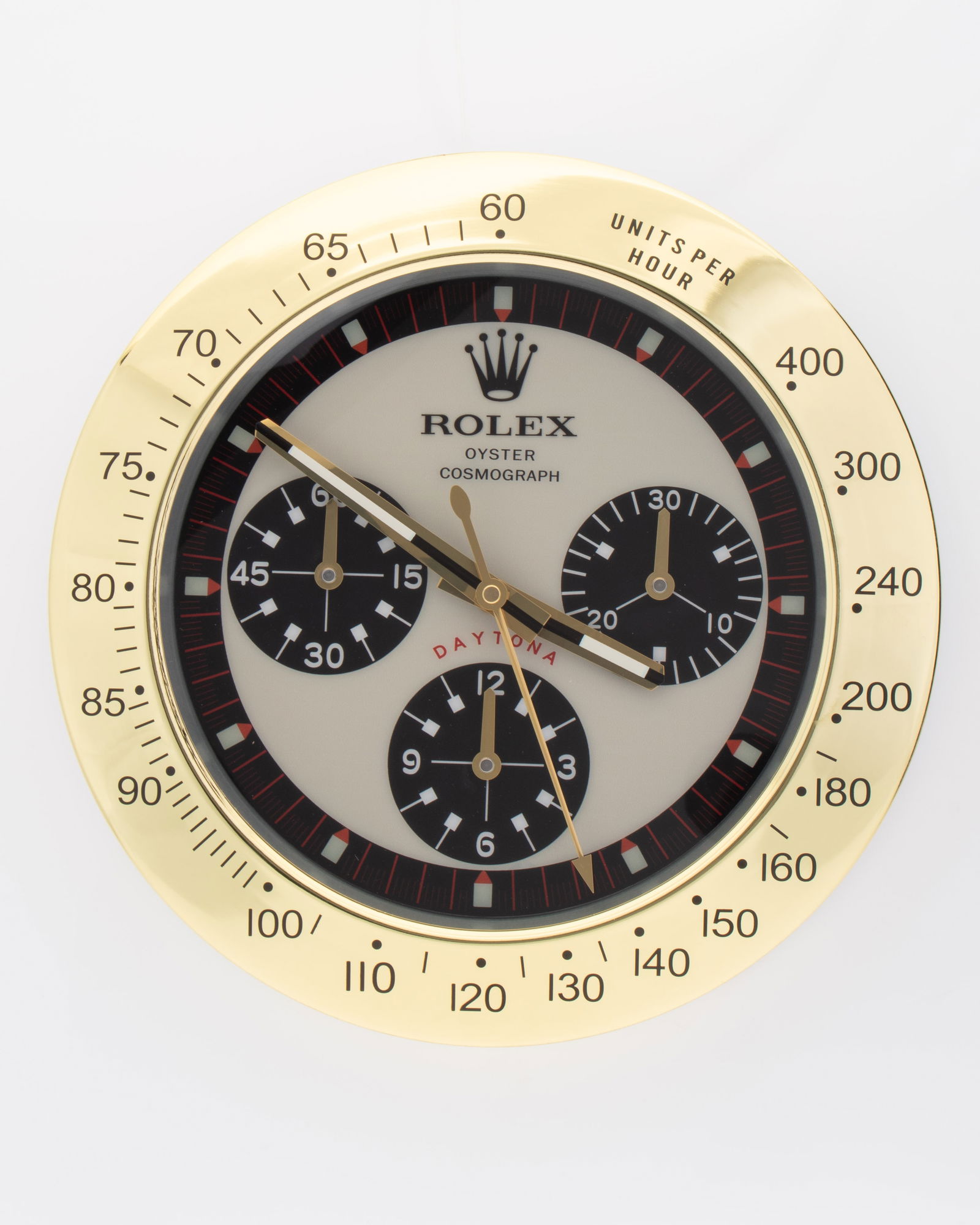 ROLEX GOLD, BLACK & CREAM DAYTONA AUTHORISED WATCH DEALERSHIP CLOCK: Clock is in excellent working condition. This oyster clock is authorised by Rolex for selected watch dealerships. With luminous, sweeping silent hands. Requiring two AA batteries. Dimensions 35cm in d