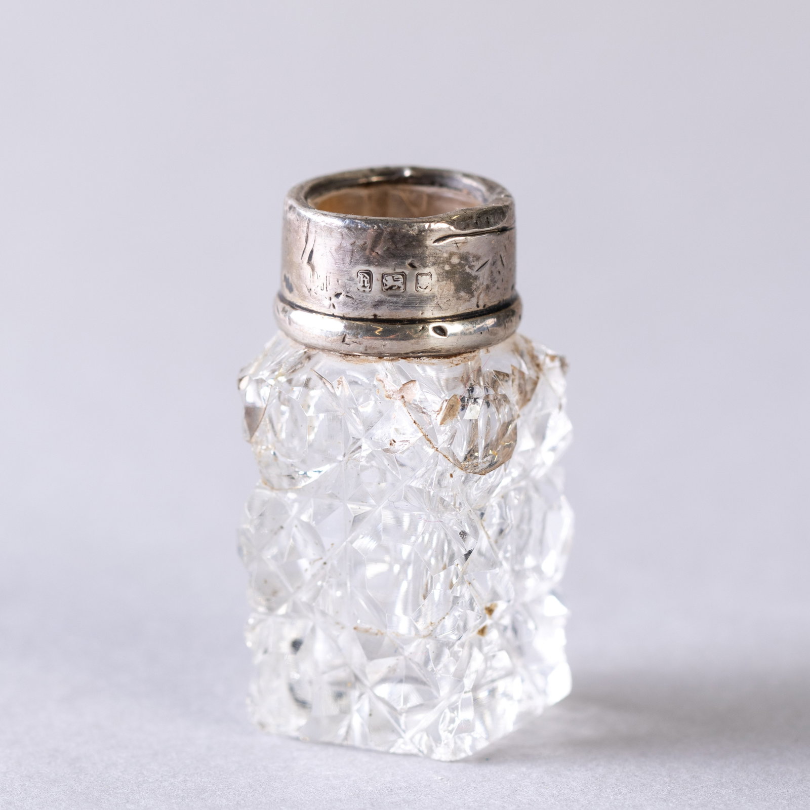 ANTIQUE SCENT PERFUME BOTTLE WITH SILVER TOP: (H) 5CM.From a collection of Wedgwood and other selected ceramic/porcelain objects. Kindly examine all photographs provided in this listing or ask for a condition report. All items offered are in gene