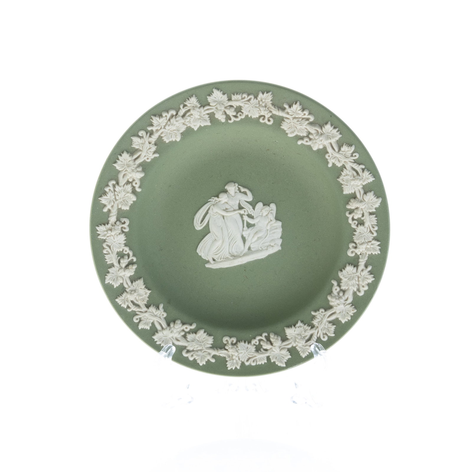 WEDGWOOD GREEN JASPER CERAMIC CLASSICAL PLATE: (L) 11CM.From a collection of Wedgwood and other selected ceramic/porcelain objects. Kindly examine all photographs provided in this listing or ask for a condition report. All items offered are in gen