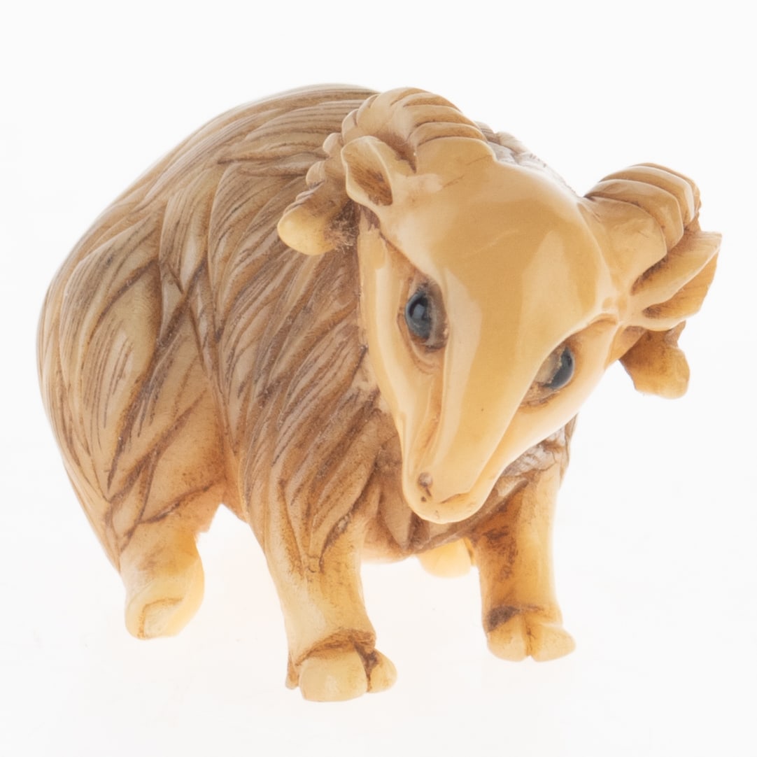 AN ANTIQUE SIGNED JAPANESE NETSUKE OF A RAM GOAT (1 of 4)