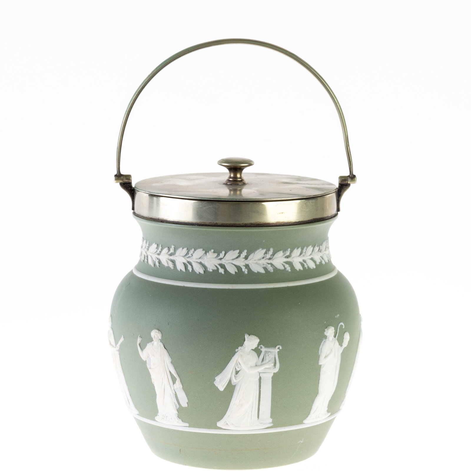 WEDGWOOD GREEN JASPER PORCELAIN CAMEO BISCUIT JAR: (H) 16CM. From a collection of Wedgwood and other selected ceramic/porcelain objects. Kindly examine all photographs provided in this listing or ask for a condition report. All items offered are in ge