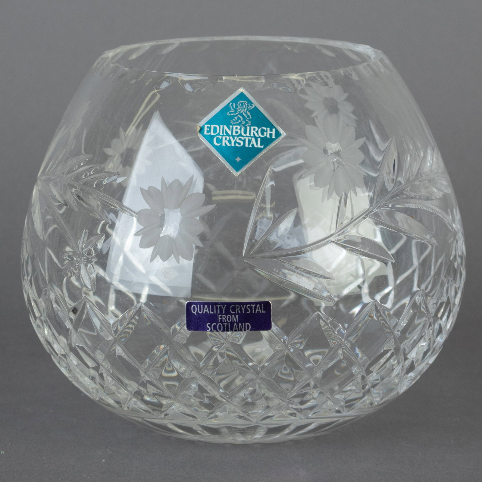 EDINBURGH CHASED CRYSTAL FLORAL GLASS VASE: From a collection of Wedgwood and other selected ceramic/porcelain objects. Kindly examine all photographs provided in this listing or ask for a condition report. All items offered are in generally go