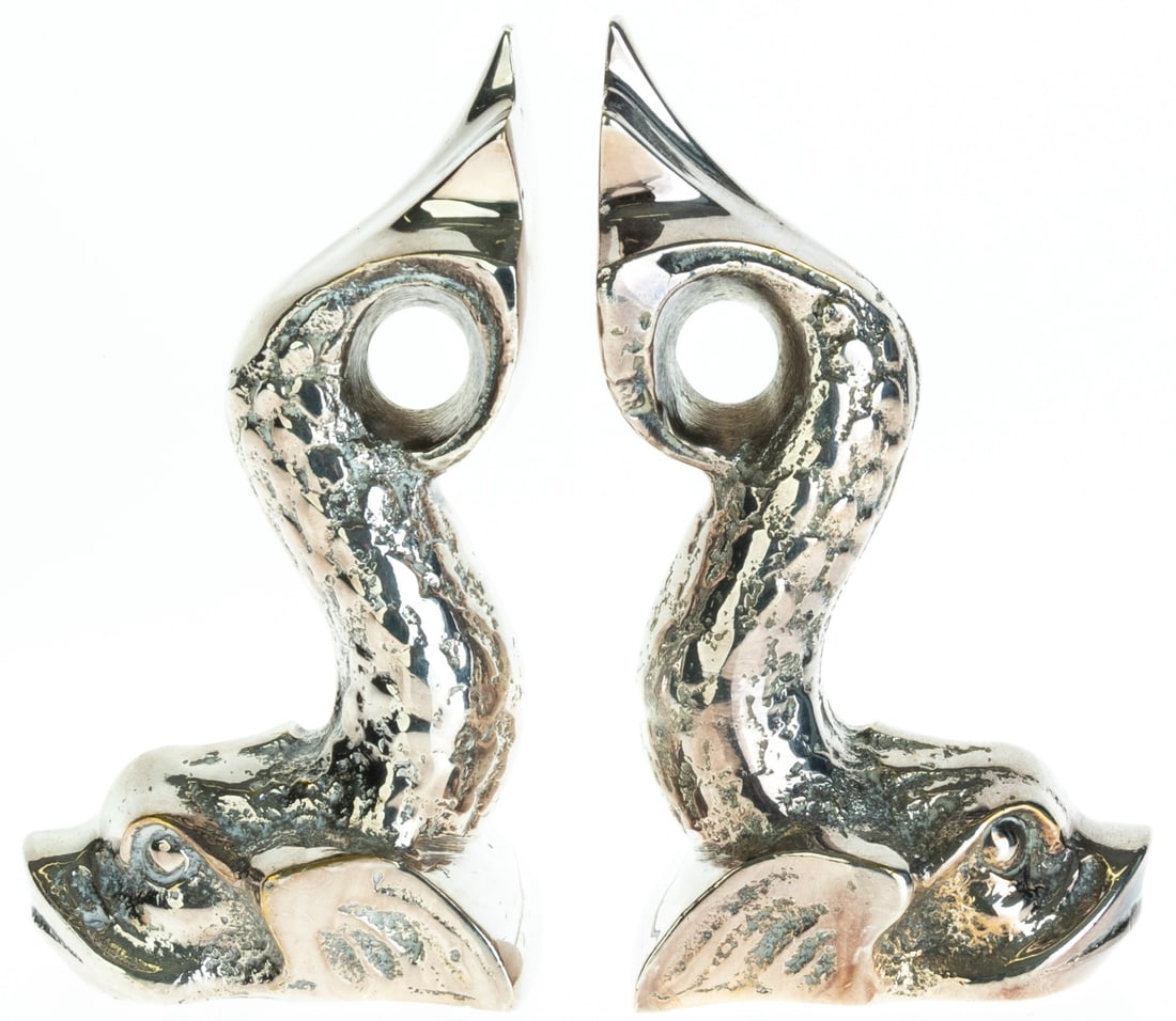 SILVER PLATED DOLPHINS BOOKENDS: 6.5x5x13CM.From a collection of Wedgwood and other selected ceramic/porcelain objects. Kindly examine all photographs provided in this listing or ask for a condition report. All items offered are in g