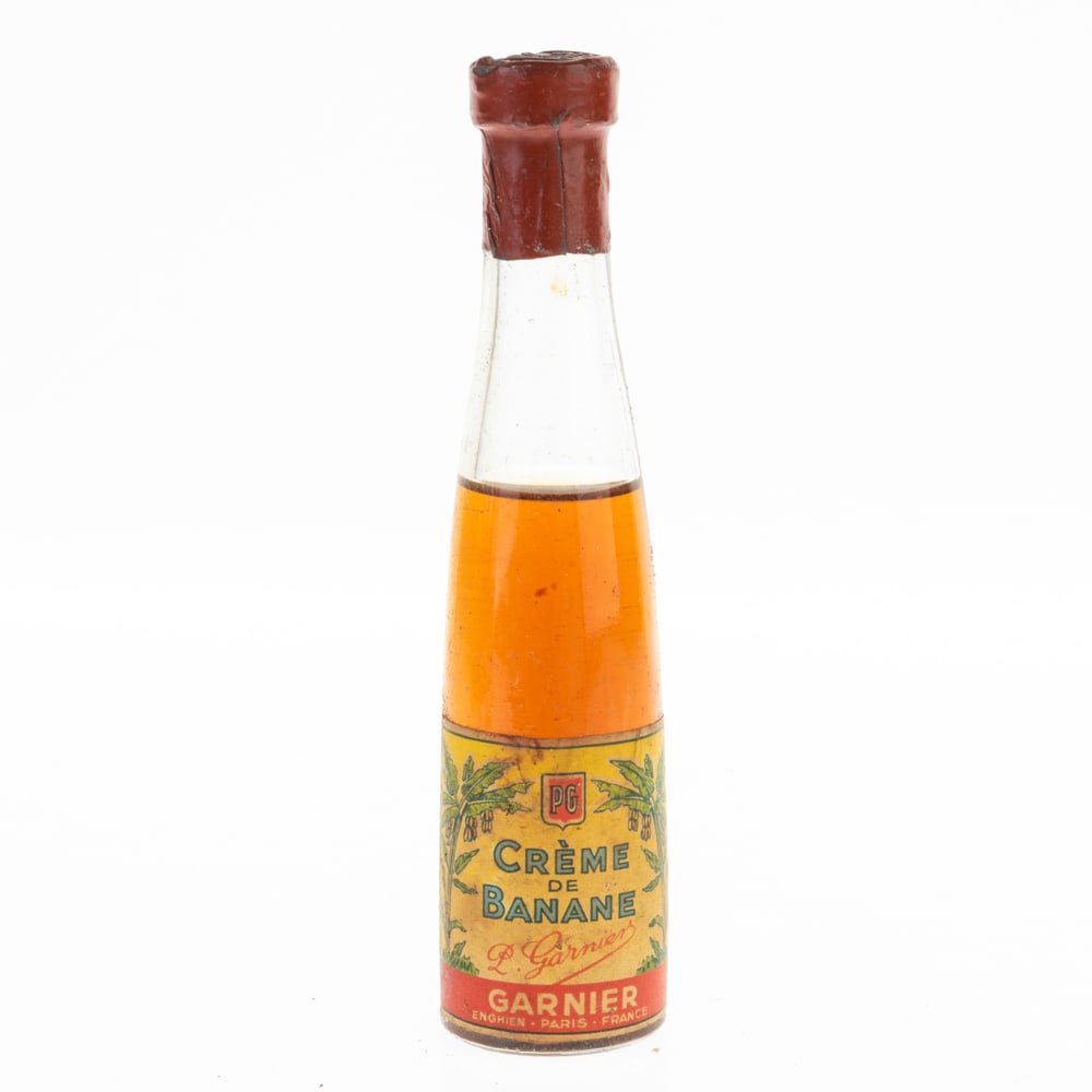 VINTAGE UNOPENED FRENCH GARNIER BANANA CREAM LIQUEUR BOTTLE: Kindly examine all photographs provided in this listing or ask for a condition report. All items offered are in generally good, pre-owned condition, unless otherwise specifically described, sold as se