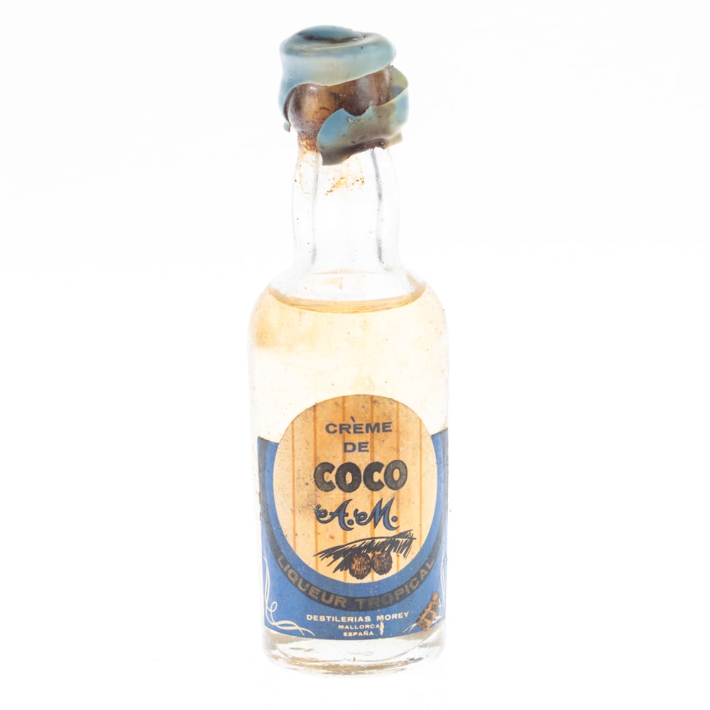 VINTAGE UNOPENED MOREY COCO CREAM RUM LIQUEUR BOTTLE: Kindly examine all photographs provided in this listing or ask for a condition report. All items offered are in generally good, pre-owned condition, unless otherwise specifically described, sold as se