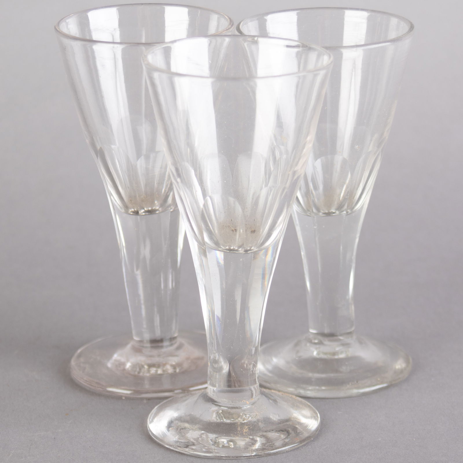 ANTIQUE SET OF THREE GEORGIAN FLUTED DRINKING GLASSES (1 of 3)