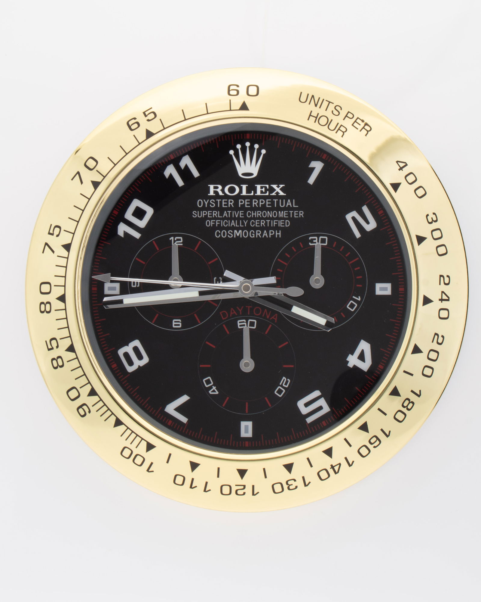 ROLEX GOLD & GREEN DAYTONA AUTHORISED WATCH DEALERSHIP CLOCK: Clock is in excellent working condition. This oyster clock is authorised by Rolex for selected watch dealerships. With luminous, sweeping silent hands. Requiring two AA batteries. Dimensions 35cm in d