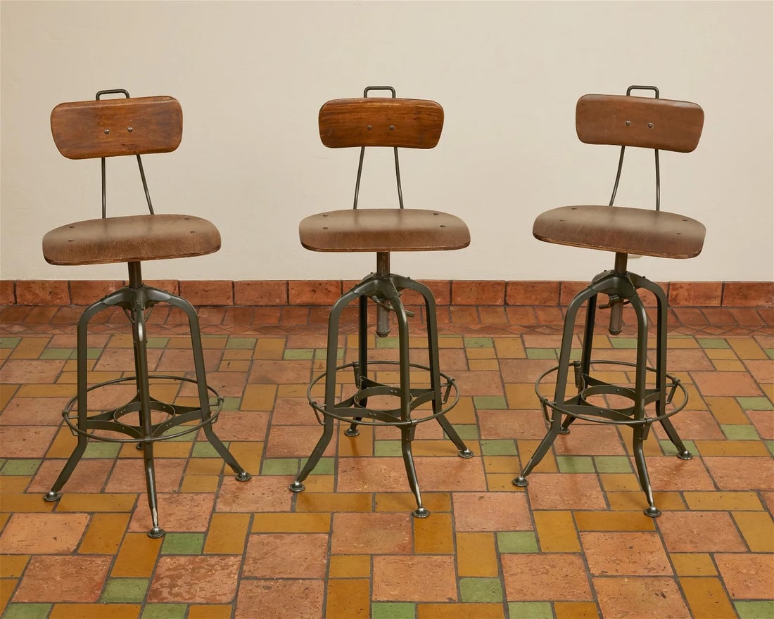 Set of Three Drafting Stools: Late 20th/Early 21st Century drafting stools with molded wood back and seat on an adjustable painted metal frame, 3 pieces. Provenance: Property from an important La Canada Flintridge estate.