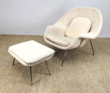 Womb Style Lounge Chair and Ottoman: Eero Saarinen-designed Womb-style Lounge Chair and Ottoman with off-white plush upholstery on a chrome tube frame. Condition: okay but needs steaming or reupholstery.