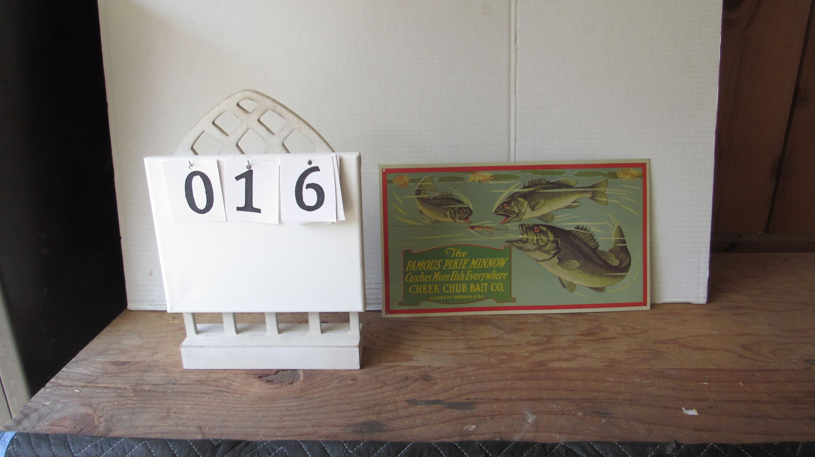 The famous pixie minnow metal sign creek chub bait company (1 of 2)