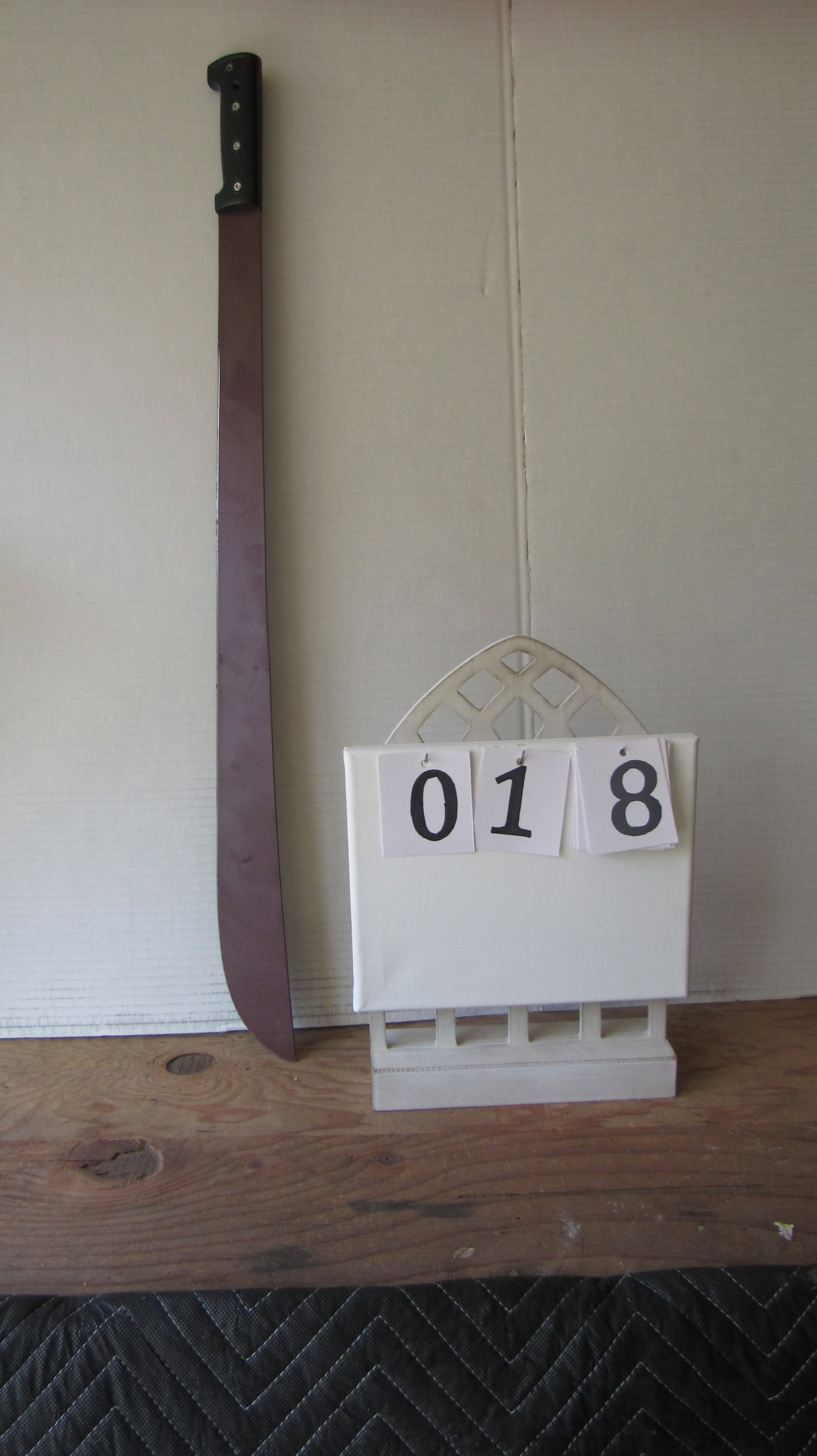 Machete: Up for auction is a high-quality machete, perfect for outdoor adventures, gardening, or survival situations. This versatile tool features a sturdy blade designed for cutting through tough vegetation,