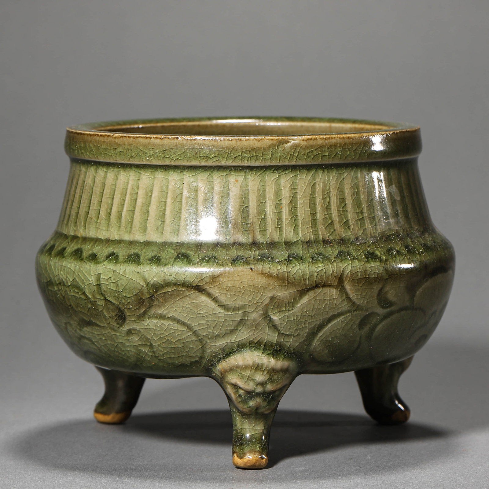 A CHINESE YAOZHOU WARE INCENSE BURNER WITH FLORAL MOTIFS. (1 of 3)