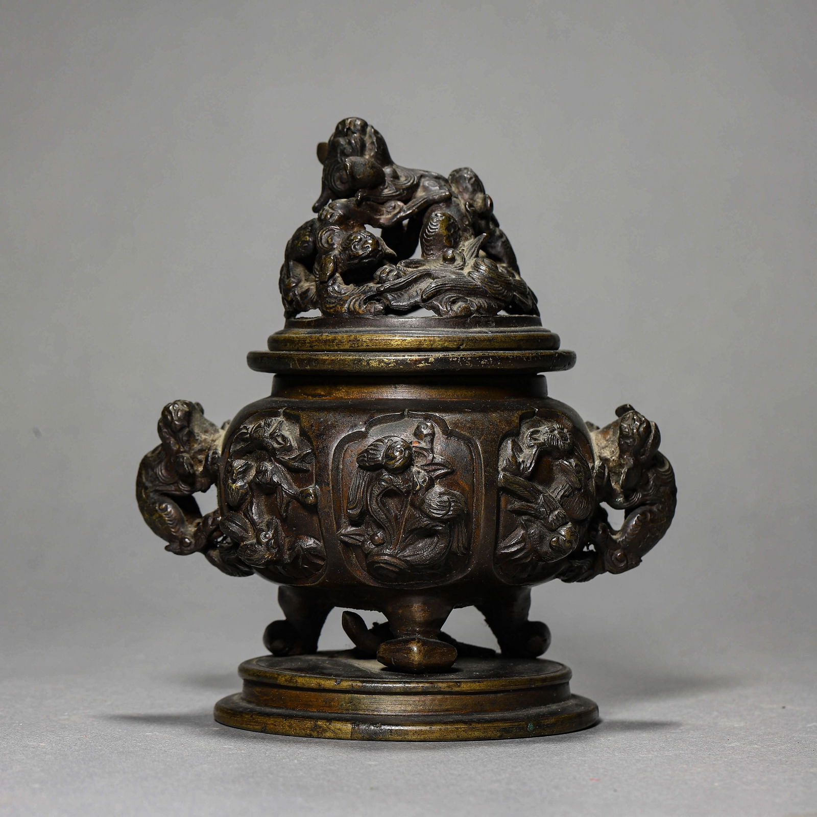 A CHINESE BRONZE INCENSE BURNER WITH BEAST-FORM KNOB (1 of 3)