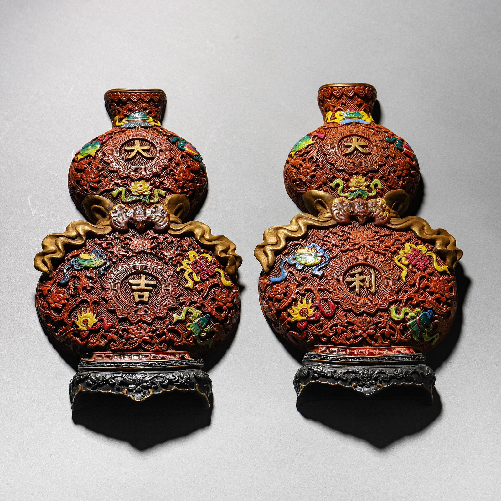 A CHINESE PORCELAIN WALL VASE IN CARVED RED LACQUER STYLE WITH “GREAT FORTUNE AND PROFIT?? MOTIF (1 of 7)