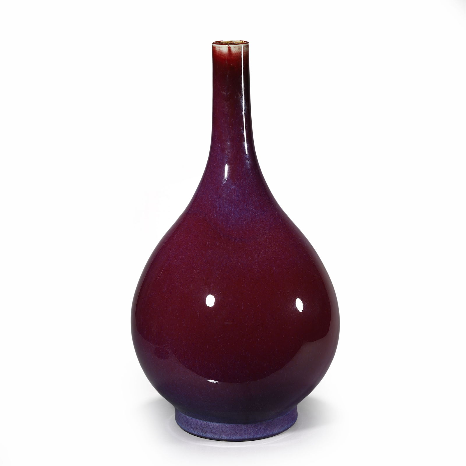 A CHINESE KILN-CHANGED GLAZE GOURD-SHAPED VASE, MARKED 'DA QING QIANLONG NIAN ZHI,' POSSIBLY QING (1 of 2)