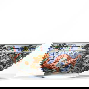 A CHINESE DOUCAI BOWL WITH DRAGON AND PHOENIX DESIGN, MARKED "DA QING DAO GUANG NIAN ZHI," POSSIBLY: A CHINESE DOUCAI BOWL WITH DRAGON AND PHOENIX DESIGN, MARKED "DA QING DAO GUANG NIAN ZHI," POSSIBLY QING DYNASTY, 19TH CENTURY. Diameter: 6 in. (15.2 cm) Condition: Any statement made in any catalogue