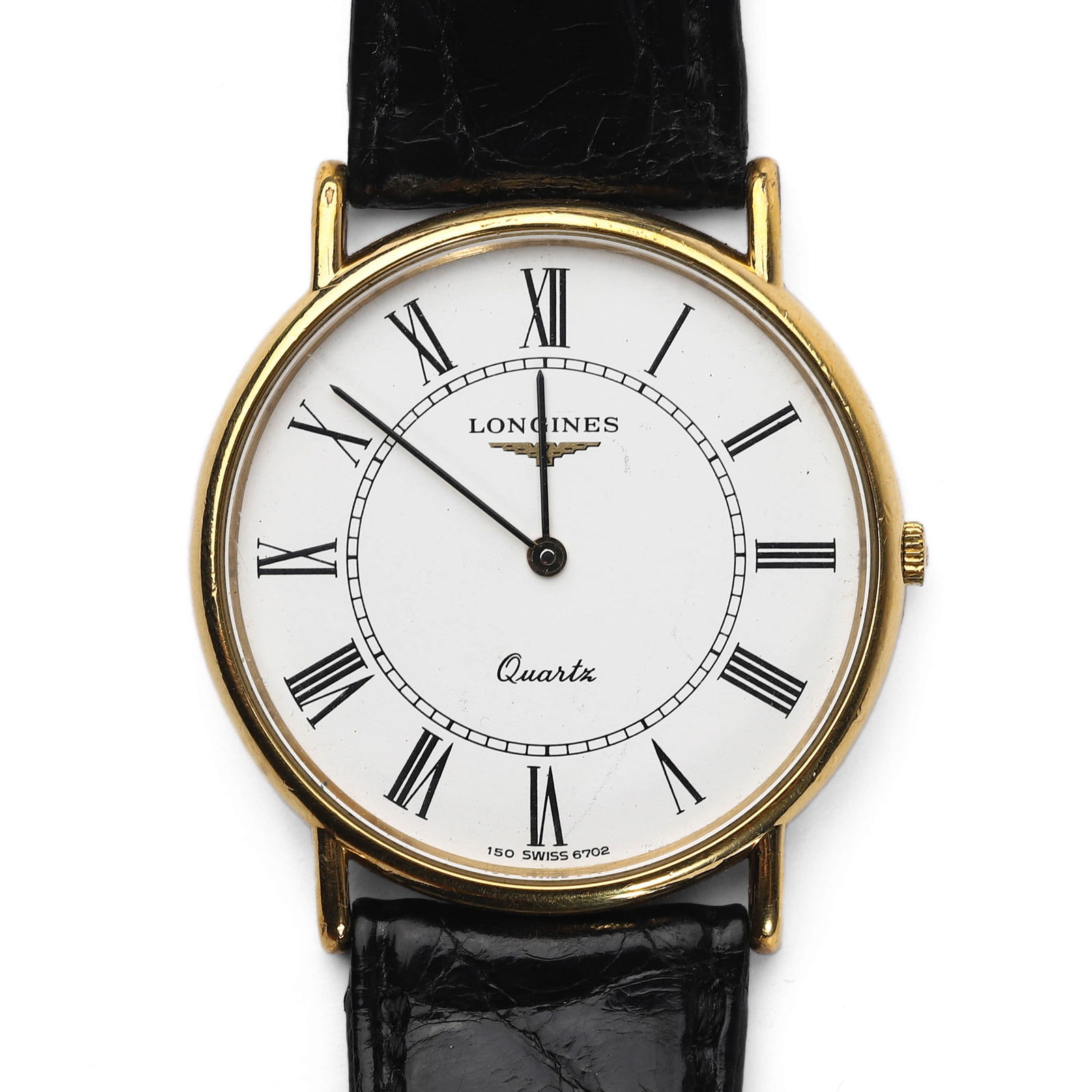 LONGINES QUARTZ WRISTWATCH WITH ROMAN NUMERAL DIAL: Dial diameter: 1 5/16 in. (33.5 mm)?Overall length: 8 7/8 in. (22.5 cm)A classic Longines quartz wristwatch featuring a round white dial with black Roman numeral hour markers and two central hands. Th