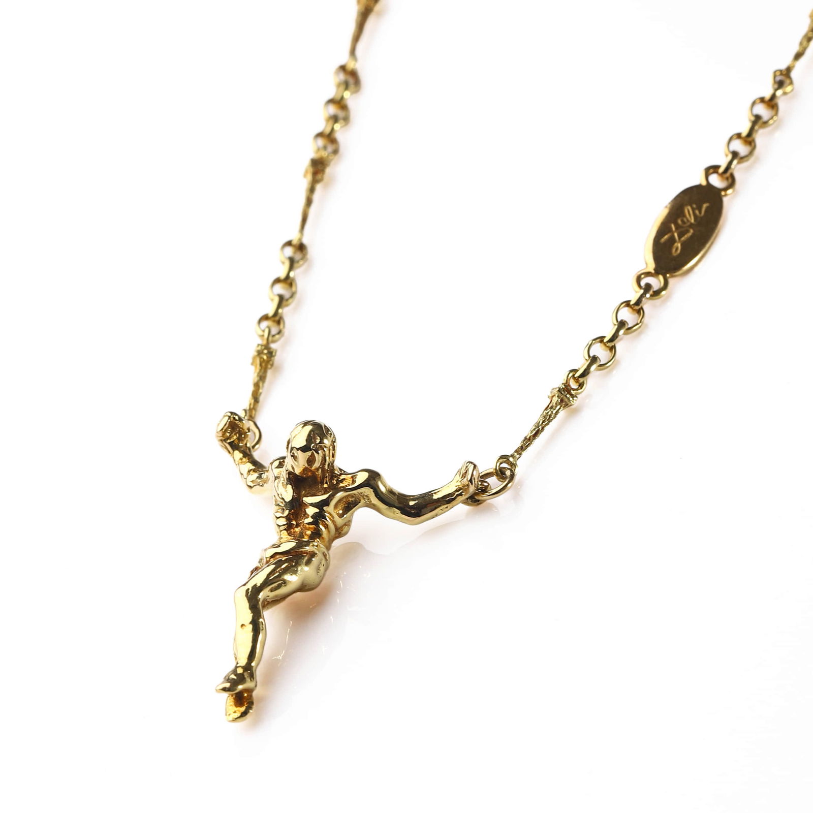 SALVADOR DALI (1904–1989), AN 18K GOLD NECKLACE/BRACELET SUITE, "CHRIST FROM ABOVE" (1 of 11)