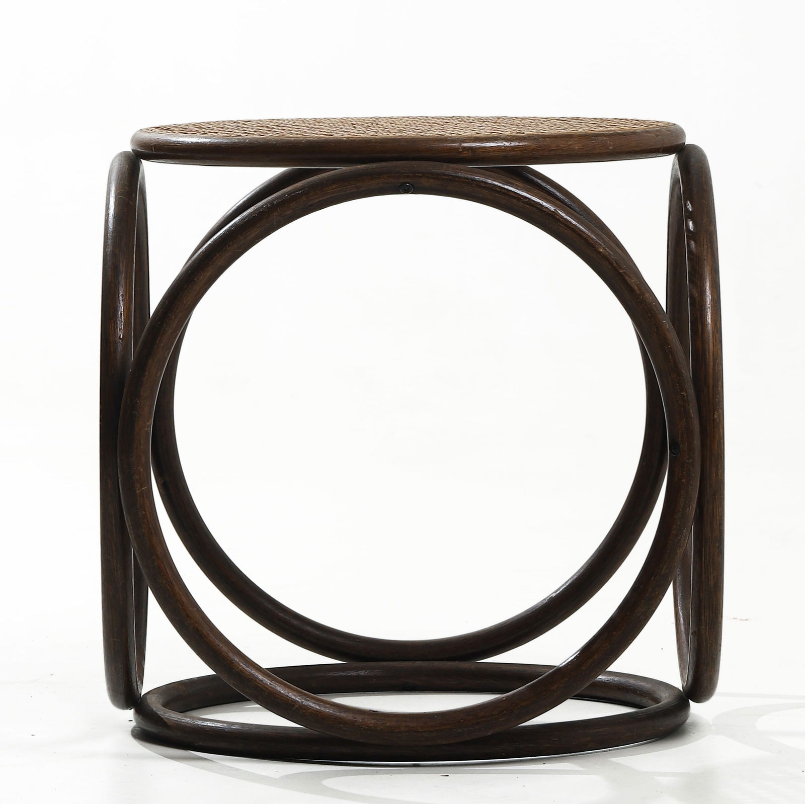 THONET ROUND RATTAN FRAME STOOL BY MICHAEL THONET, 1960s: Dimensions: Height 15 3/8 in. (39 cm), Width 15 3/8 in. (39 cm) Description Designed by Michael Thonet and produced by Thonet in Austria during the 1960s, this round stool exemplifies the elegance and