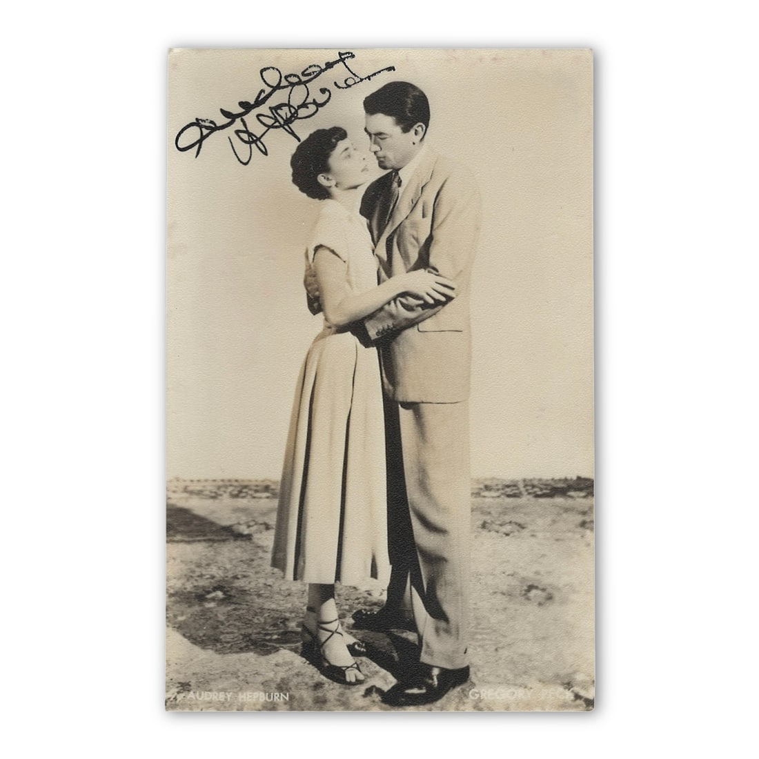 AUDREY HEPBURN SIGNED ROMAN HOLIDAY STUDIO STILL WITH GREGORY PECK (1 of 2)