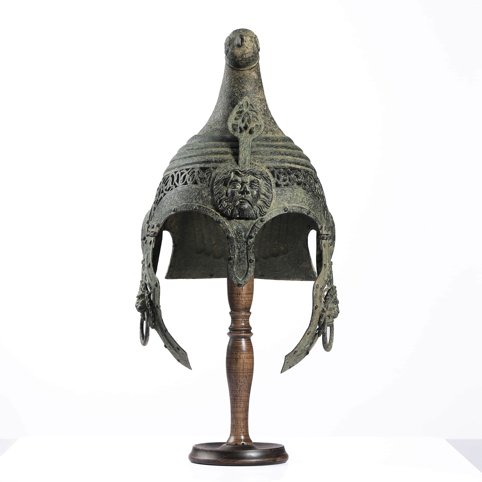 ACHAEMENID DYNASTY BRONZE HELMET: Dimensions Height: approx. 17 3/8 in (44 cm) Length: approx. 11 in (28 cm) Width: approx. 9 1/2 in (24 cm) Description A rare and imposing bronze helmet dating to the Achaemenid Empire (circa