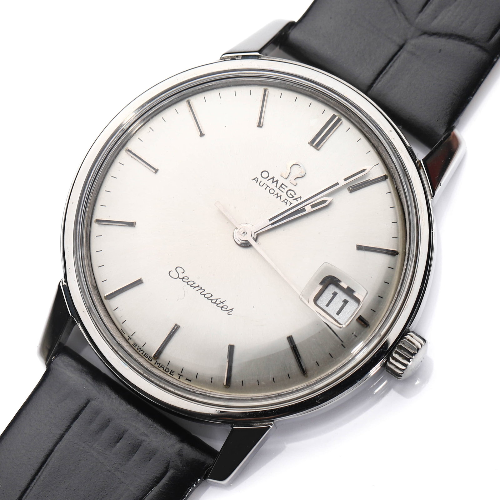 OMEGA SEAMASTER AUTOMATIC DATE WRISTWATCH: Dimensions Case diameter: 37.1 mm (1 7/16 in.); overall length: approx. 24 cm (9 1/2 in.). Description A classic Swiss wristwatch by Omega from the Seamaster collection, featuring a silvered dial sign