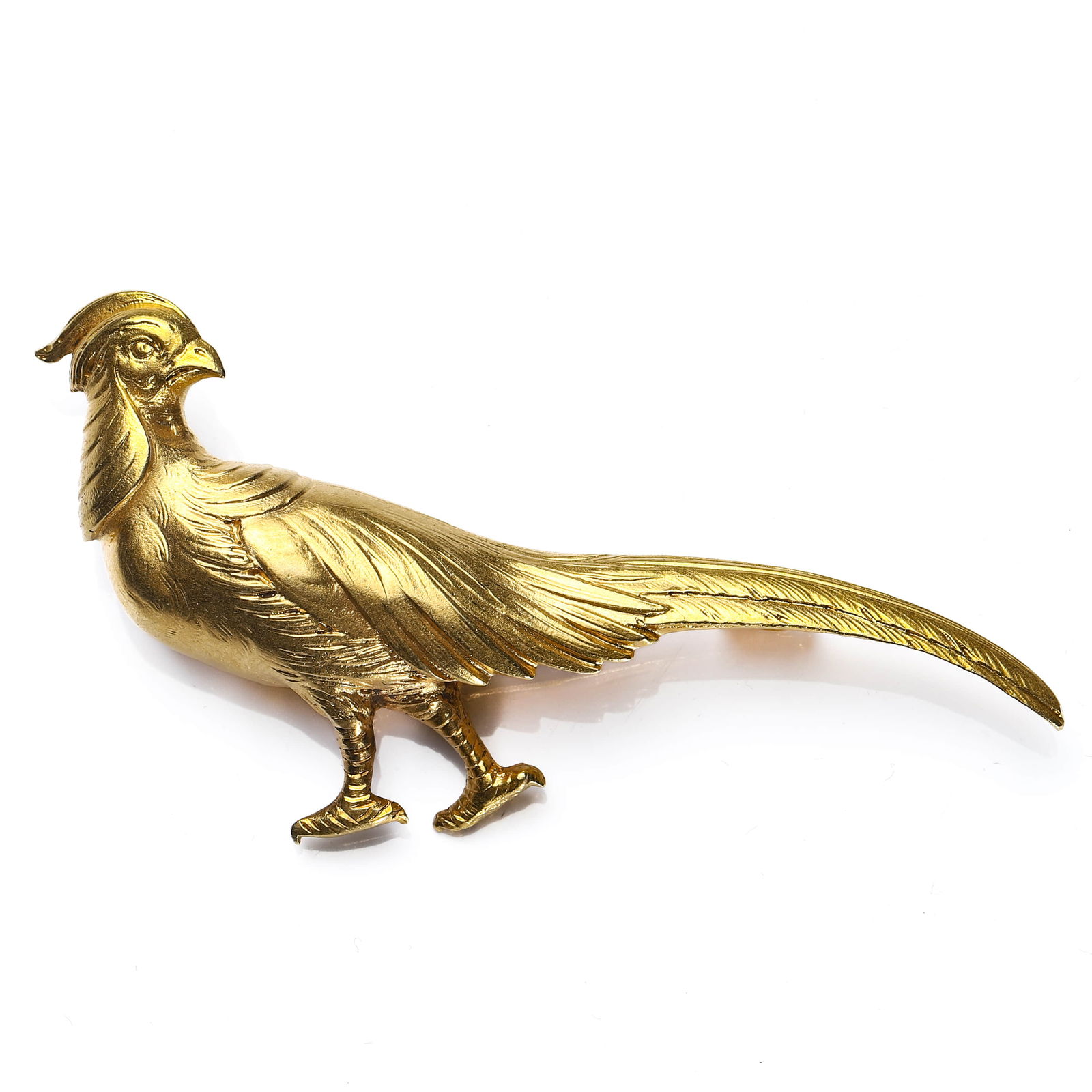 GOLD PHEASANT BROOCH: Dimensions Length: 2 11/16 in. (6.8 cm)Weight: 20.5 g Description A finely modeled gold brooch designed as a standing pheasant with an elongated sweeping tail. The bird is rendered with delicately