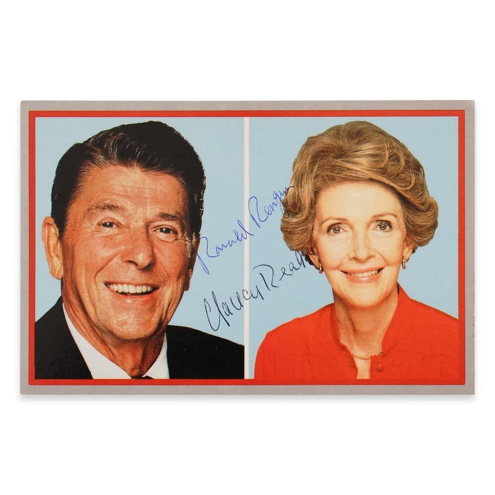 RONALD REAGAN AND NANCY REAGAN SIGNED POSTCARD: 5 1/2 x 3 1/2 in (14 x 9 cm) Provenance and Authentication: This collectible has undergone a rigorous forensic evaluation. The signatures were carefully analyzed across multiple criteria, including in
