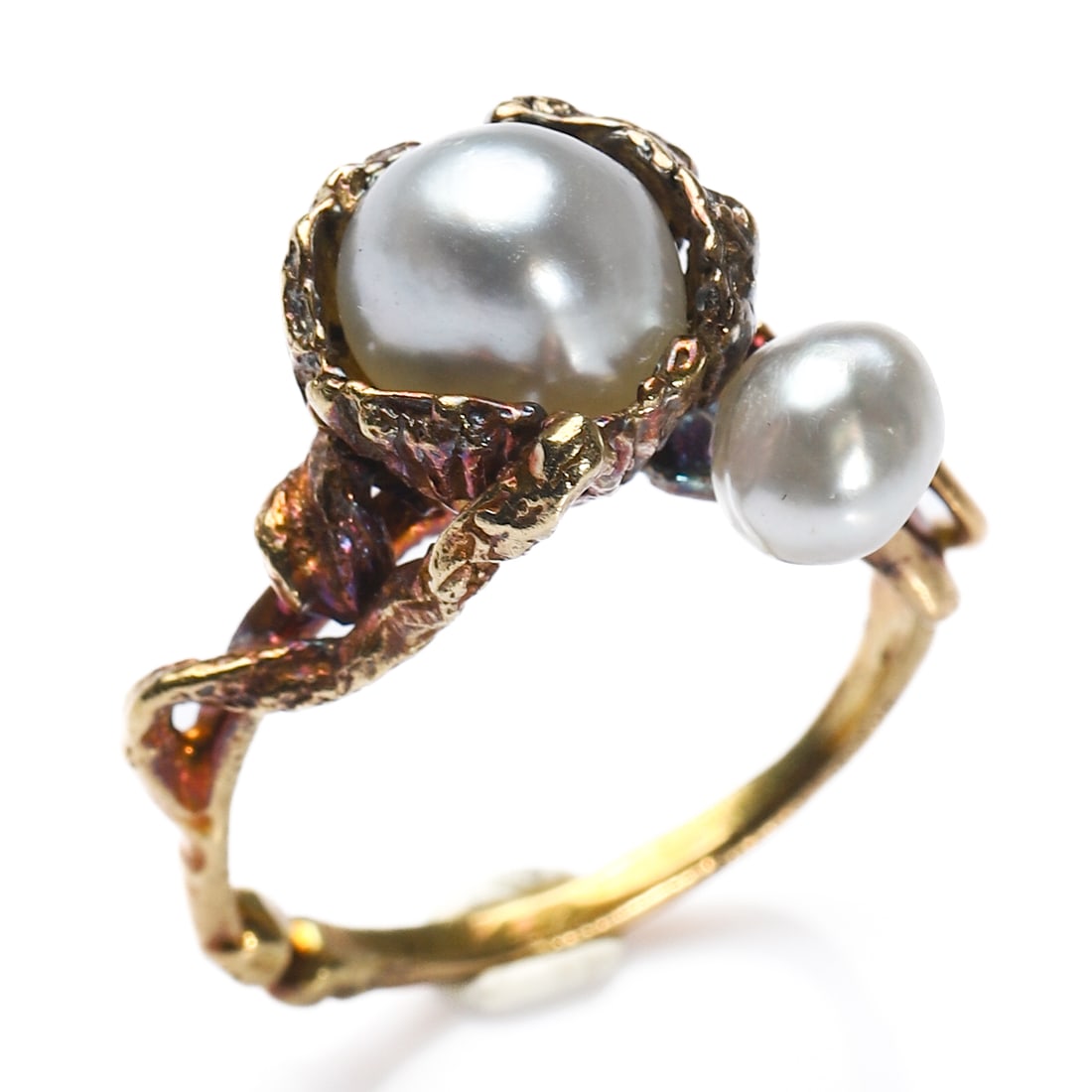 ART NOUVEAU GOLD AND PEARL RING: Dimensions Ring Size: US 6Weight: 6.1 g Description An Art Nouveau period gold ring, finely hand-crafted in 16K gold, set with two lustrous natural pearls in an organic, sculptural mount. The