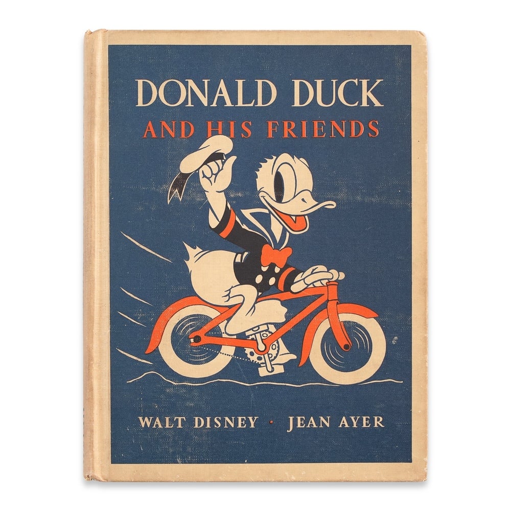 WALT DISNEY SIGNED DONALD DUCK AND HIS FRIENDS BOOK: 8 1/2 x 6 3/8 in (21.5 x 16.2 cm) Provenance and Authentication: This collectible has undergone a rigorous forensic evaluation. The signatures were carefully analyzed across multiple criteria,