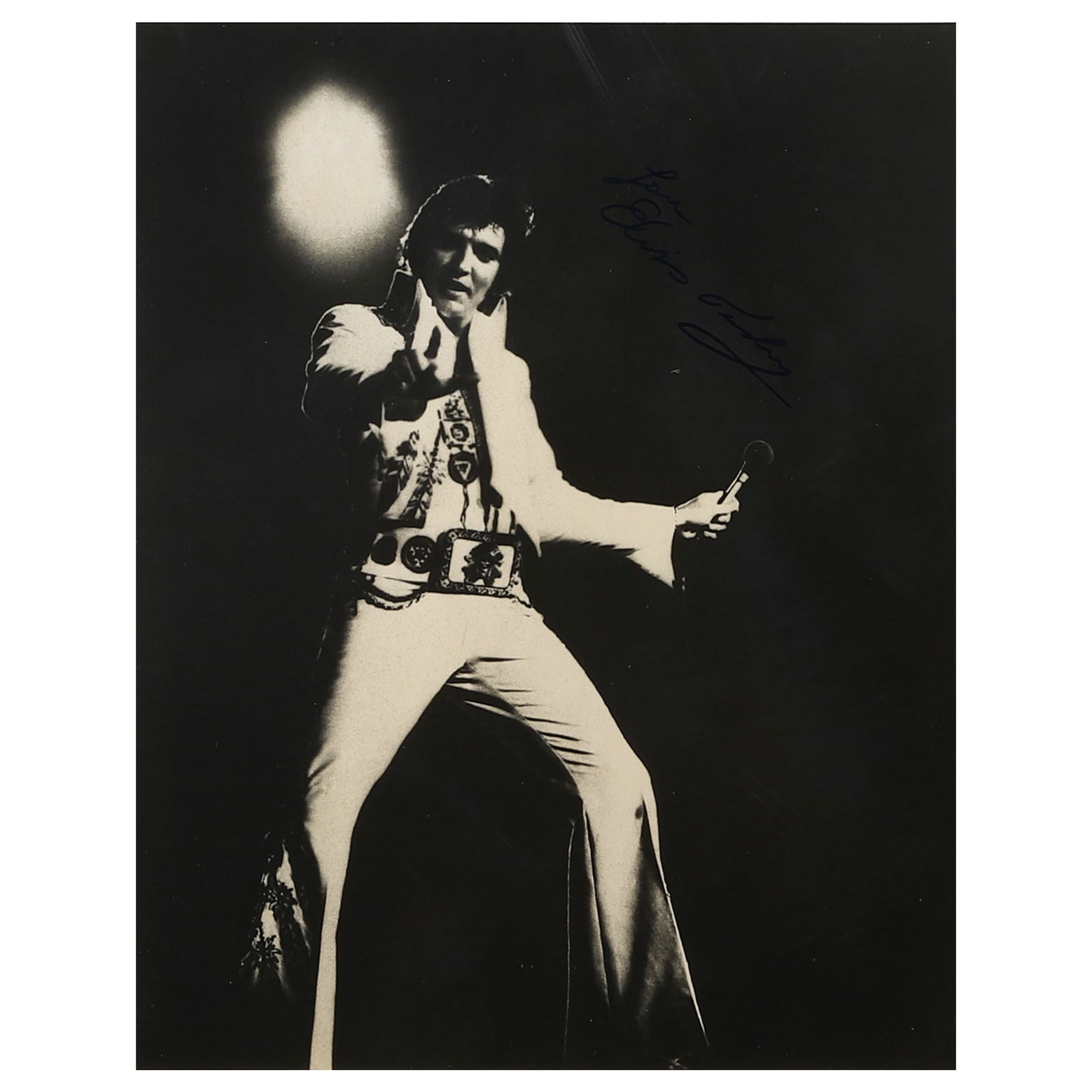 ELVIS PRESLEY (1935–1977) SIGNED PERFORMANCE PHOTOGRAPH (1 of 3)