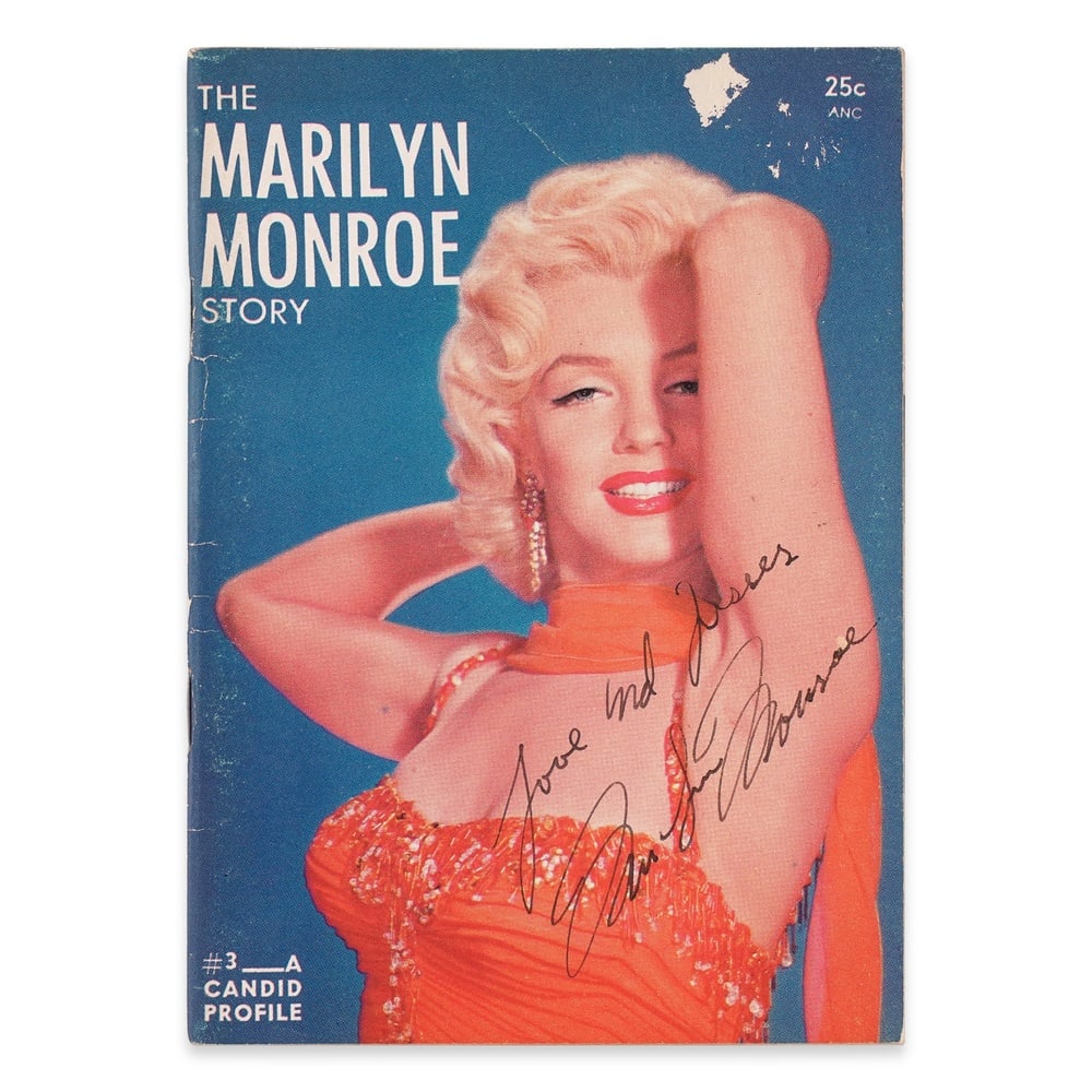 MARILYN MONROE SIGNED THE MARILYN MONROE STORY MAGAZINE: 5 7/8 x 4 1/8 in (15 x 10.5 cm) Provenance and Authentication: This collectible has undergone a rigorous forensic evaluation. The signatures were carefully analyzed across multiple criteria,