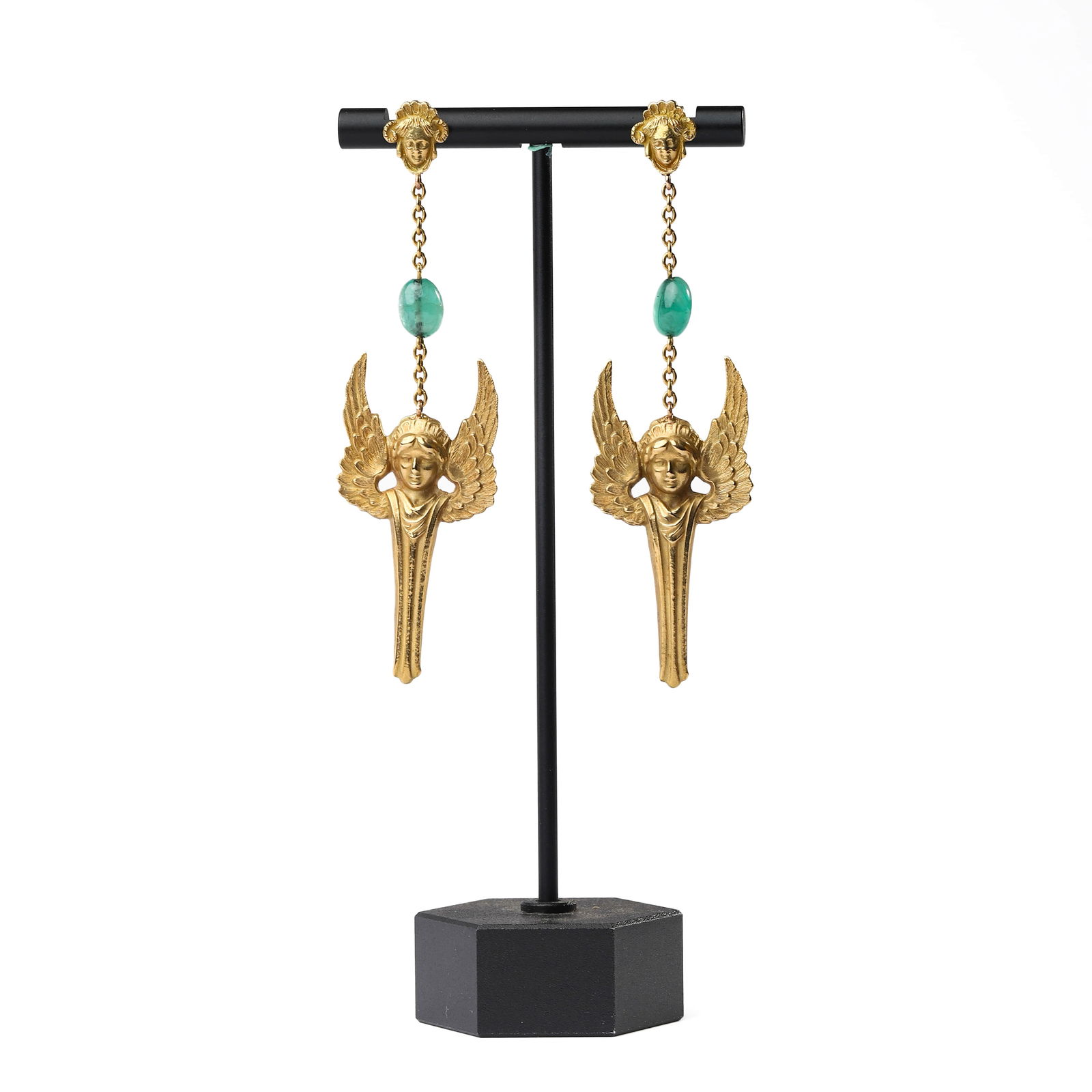 A PAIR OF GILT-METAL AND GREEN GEMSTONE DROP EARRINGS: Dimensions Length: 3 1/4 in. (82 mm); Weight: 15 g (overall) Description Each earring designed with a surmount in the form of a classical mask, suspending a short chain centered with a polished