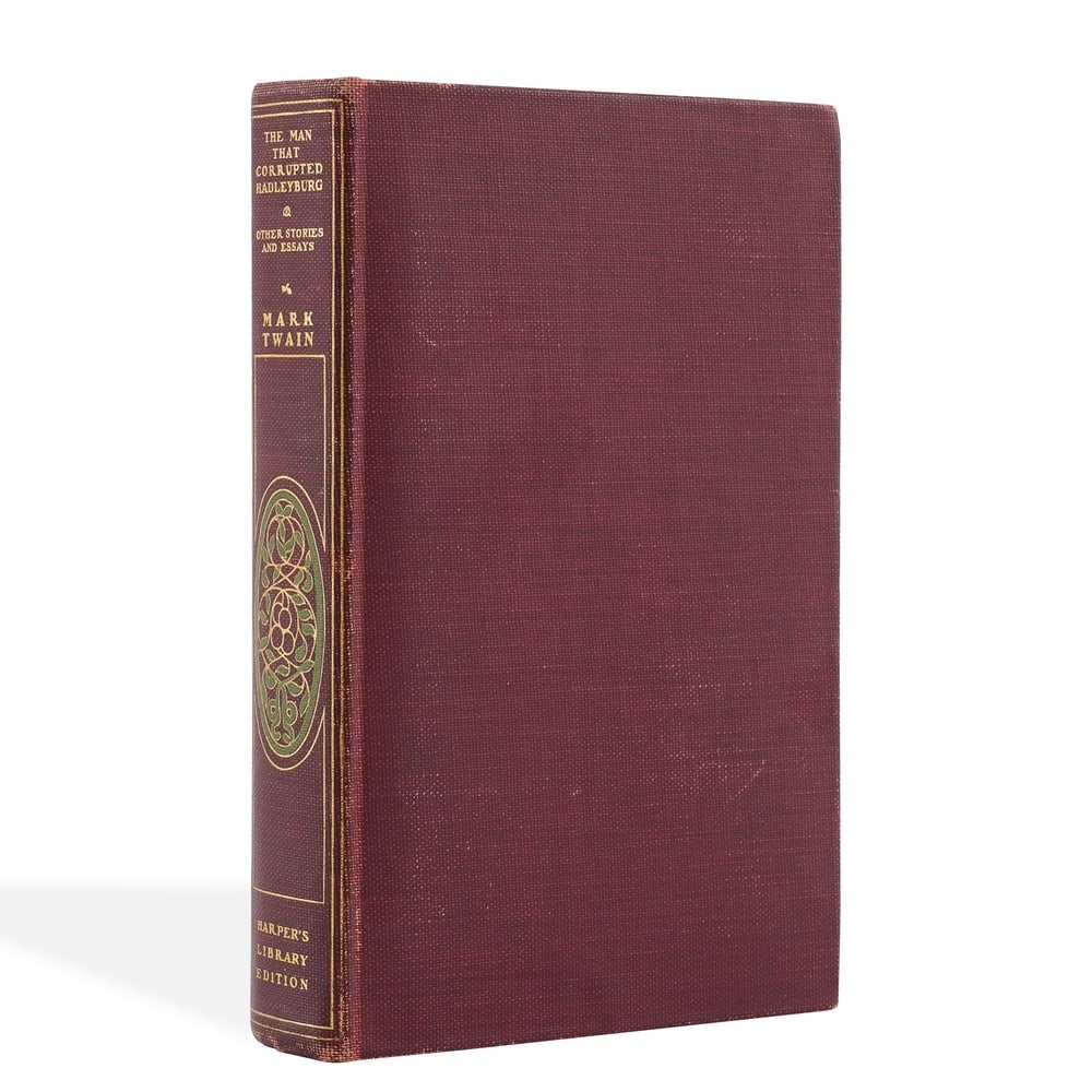 MARK TWAIN SIGNED THE MAN THAT CORRUPTED HADLEYBURG AND OTHER STORIES AND ESSAYS BOOK: 8 1/2 x 5 5/8 in (21.5 x 14.3 cm) This signed copy of The Man That Corrupted Hadleyburg and Other Stories and Essays represents a distinguished artifact from one of the most influential literary