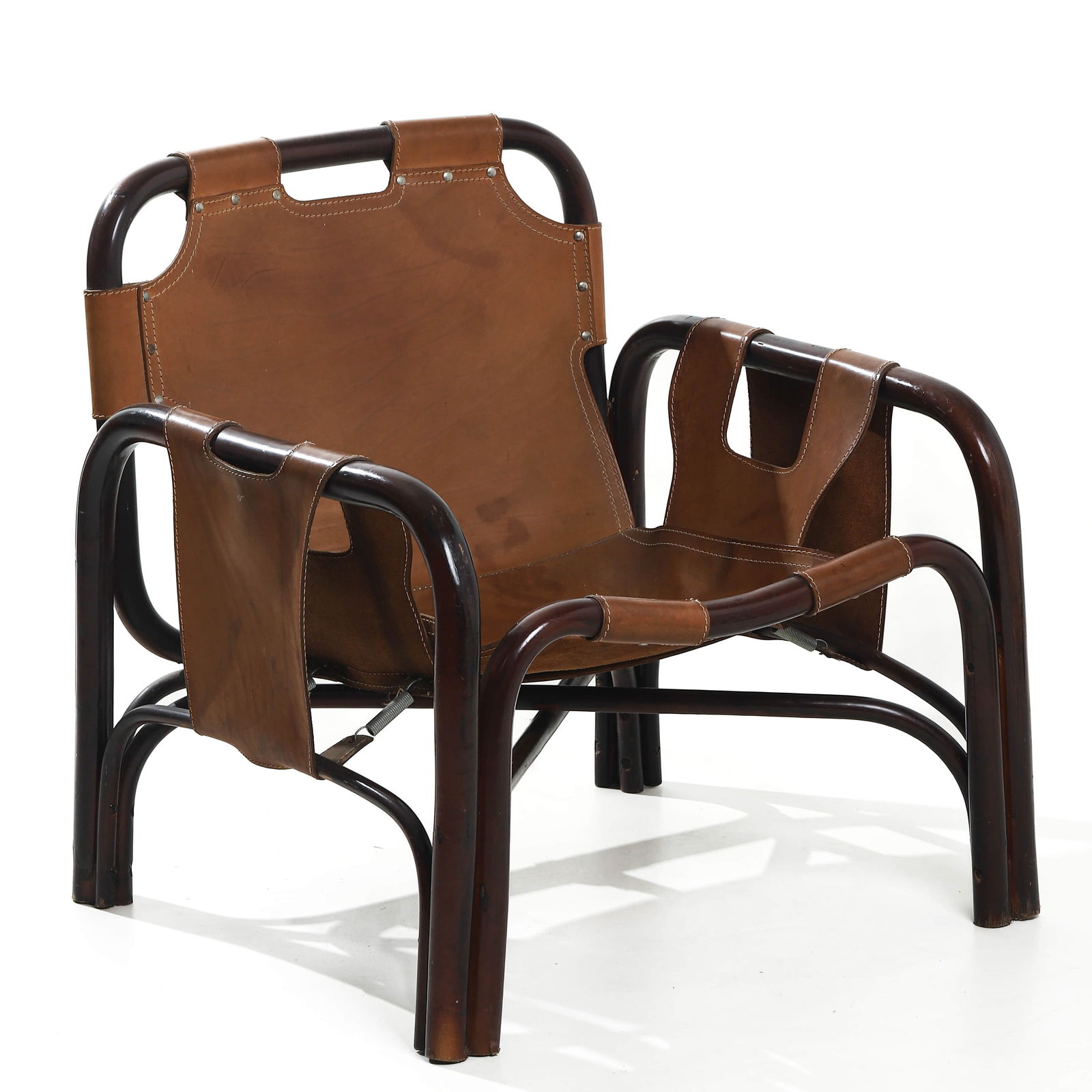 TITO AGNOLI “BAMBOO ARMCHAIR?? FOR ITALY, LEATHER AND BAMBOO: Dimensions Height 27 15/16 in. (71 cm), Seat height 15 3/4in.(40cm),Width263/8in(67cm) Description Designed in the 1960s by Tito Agnoli, this mid-century bamboo armchair reflects the designer’s refi