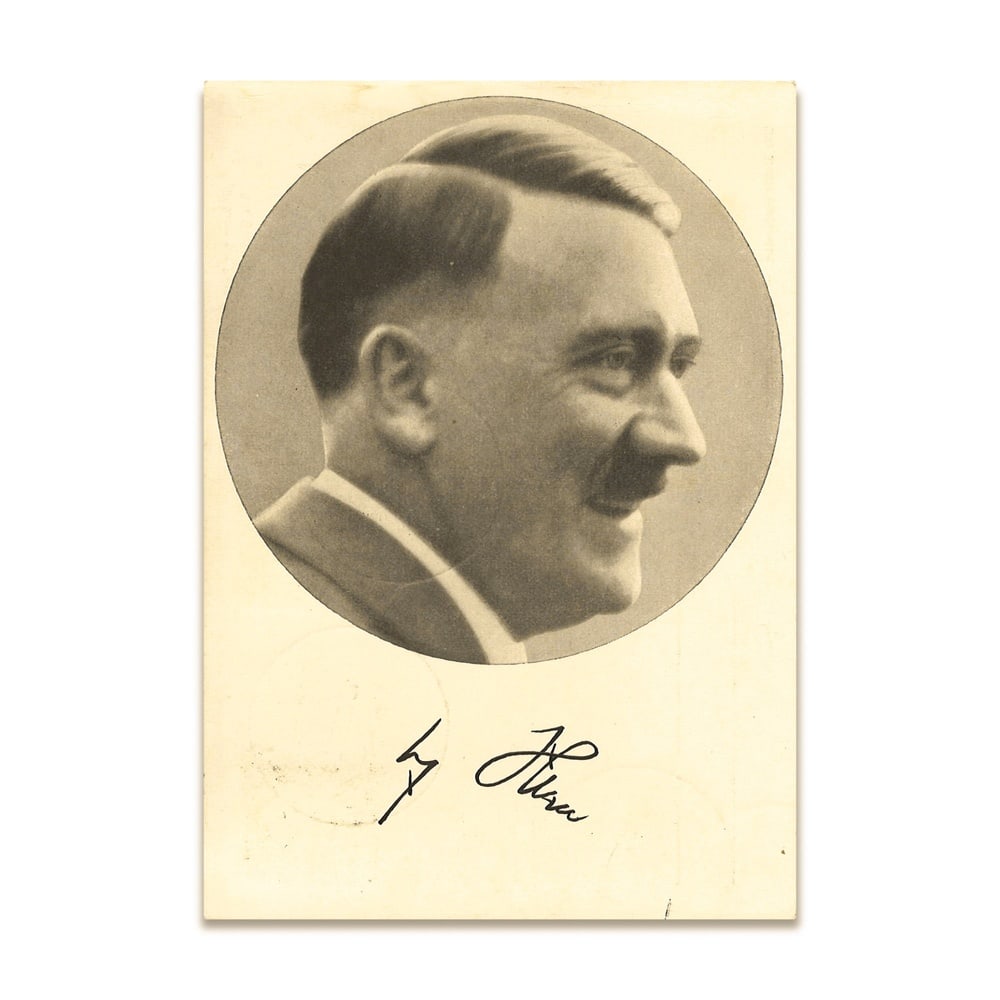 ADOLF HITLER SIGNED POSTCARD: 5 7/8 x 4 1/8 in (14.8 x 10.5 cm) This historically significant signed postcard features a classic portrait image of Adolf Hitler accompanied by his authentic period signature. Produced in Germany