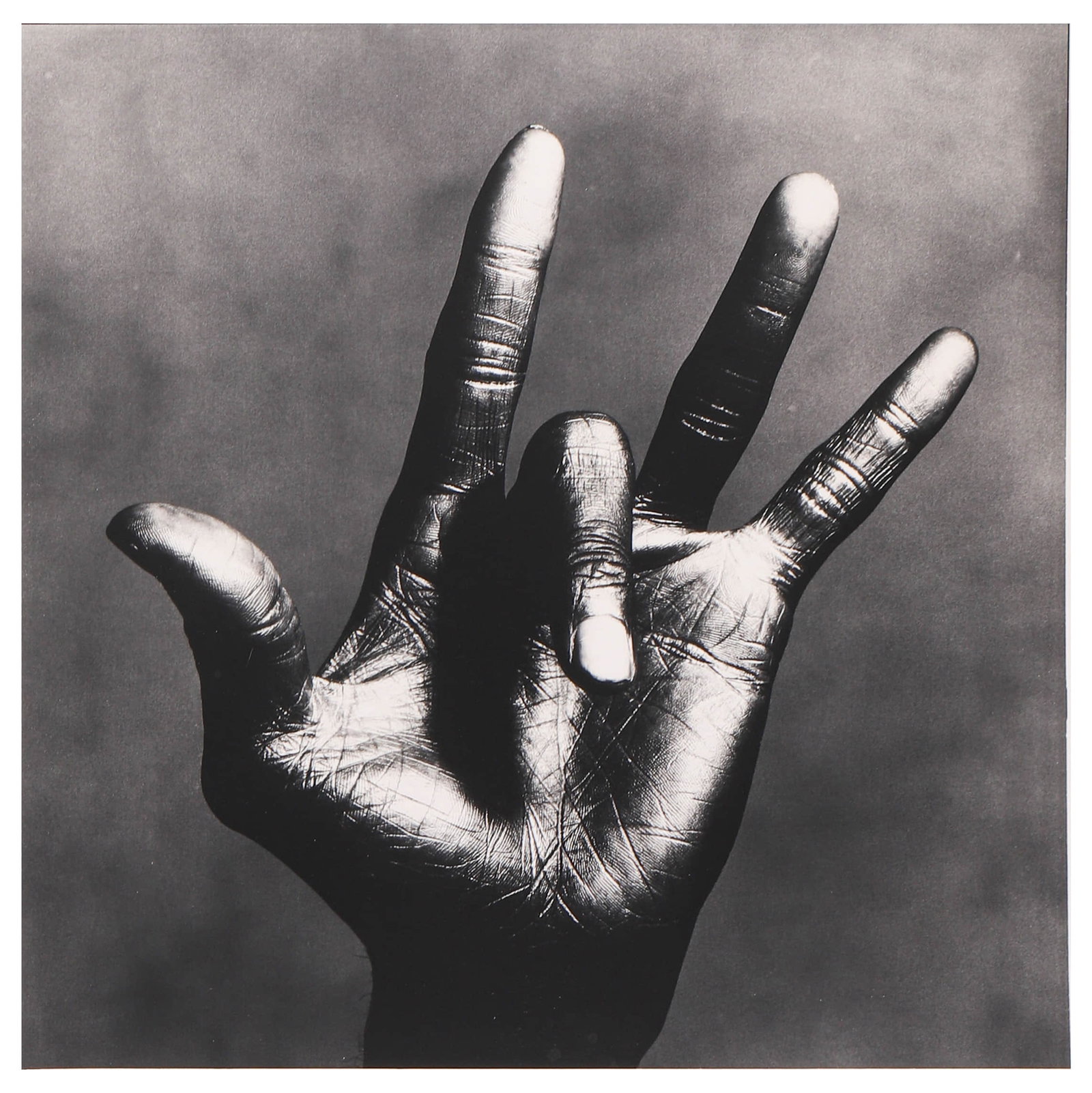 IRVING PENN (1917–2009), THE HAND OF MILES DAVIS, NEW YORK: Artist Irving Penn Title The Hand of Miles Davis, New York Medium Gelatin silver print, mounted on board Signature Signed in pencil on the verso Dimensions Image 14 3/8 × 14 3/8 in. (36.6 × 36.6 cm)